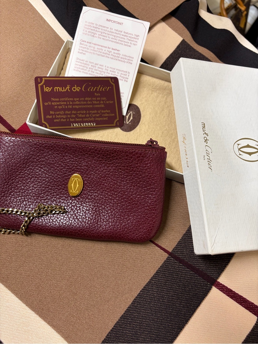 Cartier Purple Satin-Lined Wristlet with Gold Zip Detail